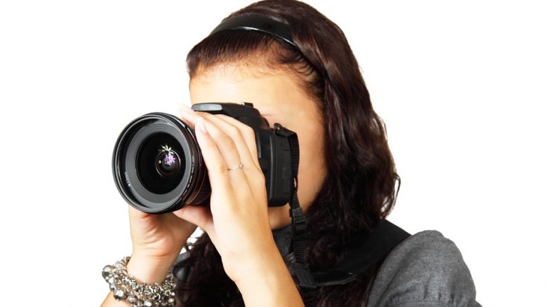 woman using camera